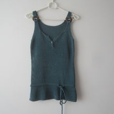 "Vintage Knitted Top Sleeveless Sea blue - green Top Small Size Top Romantic Summer Top Knitted Spaghetti Straps Comfortable Top  Estimated size: M Measurements (lying flat): Bust: 15.5\"/ 39.3 cm Width: 14\"/ 35.5 cm Length: 25.5\"/ 65 cm Please check measurements to insure a proper fit. Remember to allow yourself some extra room for movement. You can compare these with something from your closet that fits you well. This sweater will come to you freshly laundered and ready to wear. Please feel free contact me if you need additional measurements or have any questions Condition: great Vintage Condition SHIPPING * I ship worldwide via Priority mail (Latvijas Pasts) from Latvia (EU). * I ship from Europe, so please allow 2 to 4 weeks for the package to arrive if you live overseas. * Europe 5 Blue Knitted Sleeveless Vest, Stretch Green Knit Crochet Top, Green Knit Sleeveless Vest, Green Sleeveless Knit Vest, Blue Knitted Sleeveless Top, Blue Sleeveless Knitted Top, Fitted Green Crochet Sleeveless Top, Green Fitted Sleeveless Crochet Top, Fitted Green Sleeveless Crochet Top