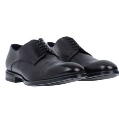 Elevate Your Formal Wear With These Sleek Black Dress Shoes From Sergio Rossi. Designed For The Modern Man, These Shoes Feature A Comfortable Fit And A Sophisticated Look. With A Size Of 11.5 In The Us Shoe Size, You're Sure To Find The Perfect Fit For Your Feet. The Brand Is Known For Their High-Quality Footwear, Making These Shoes A Great Investment For Any Wardrobe. The Black Color Adds A Timeless Touch To Any Outfit, Making Them Versatile For Any Occasion. Perfect For The Office Or A Special Modern Black Lace-up Shoes For Formal Occasions, Elegant Low-top Calf Leather Shoes, Designer Plain Toe Dress Shoes For Office, Designer Plain Toe Lace-up Shoes For Business, Business Leather Shoes With Branded Heel Counter, Black Low-top Dress Shoes For Formal Occasions, Sleek Round Toe Dress Shoes For Business Casual, Sleek Dress Shoes With Round Toe For Business Casual, Elegant Lace-up Shoes With Removable Insole For Work