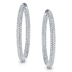 These grandiose hoop earrings showcase 460 round-cut sparkling white natural diamonds in pave setting rows of diamonds for a 7 carat tw. pair. These beautiful earrings are crafted of exquisite 14k white gold and secure with Safe Lock clasps for easy wear. These large hoops will be sure to make a statement about fashion measuring almost 2 in height. Safe Lock, White Lab, Pave Setting, Diamond Hoop Earrings, Easy Wear, Round Diamond, Beautiful Earrings, Lab Grown, Lab Grown Diamonds