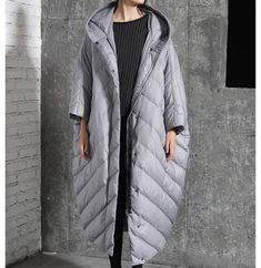 This down coat make with 90% duck down ,very warm in the winter .also have plus size to 10 XL. This is a winter down jacket fill with down.we design it with a very thick and warm style.this hooded down jacket could keep you very warm in the cold winter.the side pockets is very useful.a unique design women winter coat. Material: 90% duck down ,polyester Style: Casual Package Contents: 1 x down coat Free Size: Length:120cm chest:170cm shoulder and sleeve:68cm Chic Winter Coat, Long Down Coat, Duck Down Jacket, Hooded Cape, Cocoon Coat, Y2k Aesthetic Outfits, Bat Sleeve, Womens Parka, White Ducks