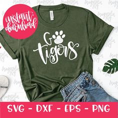 a green shirt with white lettering that says, paintbrushes svg - dxf