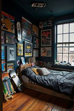 a bedroom with skateboards and posters on the wall