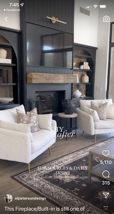 a living room filled with furniture and a fire place in the middle of a room