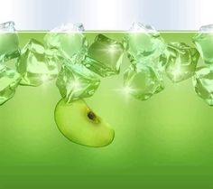 an apple sliced in half with ice cubes on the side and light green background