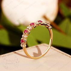 "(Please confirm your US size when you make an order) ❤Jewelry Details -Gold Type : 14k gold / 10k gold(Choose One in Material Option) Center Stone: NATURAL Ruby, 2.1mm*5pcs Ruby Total Carat Weight: Approximately 0.25ct Cut: Round Cut / 3EX Side Stone: 0.08cttw diamond Color: G-H Clarity: SI1 Cut: Round Cut / 3EX SKU: YR0296 ~*-*~Purchase Guarantee: - All our jewelry is handmade, and each process is refined. - 14 Day Refund Guarantee. - All our products are Free Shipping. - Free Gift Box&Pac Wedding Lab-created Ruby Ring With Prong Setting, Yellow Gold Lab-created Ruby Wedding Rings, Yellow Gold Wedding Ring With Lab-created Ruby, Wedding Ruby Ring In Yellow Gold With Accent Stones, Wedding Yellow Gold Ruby Ring With Accent Stones, Lab-created Ruby Wedding Ring With Round Shape, Gold Ruby Half Eternity Ring For Wedding, Stackable Ruby Wedding Ring, Wedding Stackable Ruby Ring