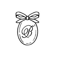 the letter b in a glass jar with a bow on it's head and an initial