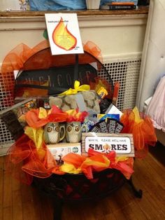 a basket filled with items sitting on top of a wooden floor