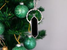 "Follow our INSTAGRAM for updates: @bustani.jewelry © ♠ Handmade with passion ♠ © Created in my home studio. Soldered stones with lead free solder,  oxidized** ♂ ☼ Beautiful and unique stones black obsidian crystal  framed with artistic whimsy ☼ ♀ Dimension: The length of pendant   2 3/4'' inches You can choose the length chain Fast Shipping  With every purchase to USA, EU, Worldwide I guarantee registered priority shipping by Global Express  --------------------------------------------------------------------------------------------------- Each piece is handcrafted in my studio. It comes ready for gift giving in packaging organza and hand-painted cardboard box. My products are packed with great carefulness.  Links  ✿ ✿ ✿ See other terrarium jewelry in my shop ✿ ✿ ✿ ➤ https://www.etsy.com/ Crystal Point Jewelry, Painted Cardboard, Black Obsidian Crystal, Jewelry Valentines Day, Obsidian Necklace, Obsidian Crystal, Terrarium Jewelry, Necklace Mens, Black Obsidian