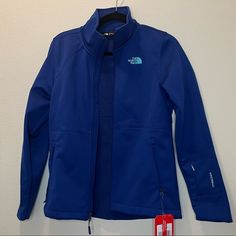 Jacket Has Never Been Worn And Is In Brand New Condition. Features A Variety Of Pockets On The Arm And Sides. Windwall Technology To Have Even More Rain/Wind Resistance. The North Face Purple Long Sleeve Outerwear, Functional Blue Outerwear For Work, Blue Functional Outerwear For Work, The North Face Purple Outerwear For Fall, Spring Blue The North Face Outerwear, Blue The North Face Outerwear For Spring, Brown North Face Jacket, Black North Face Coat, Black North Face Puffer