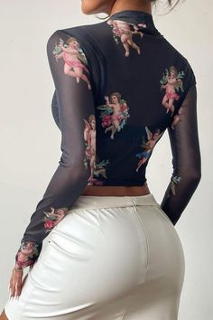 Add some love to your wardrobe with this cute crop top, crafted from high-quality transparent sheer printed with little angels, and featuring a nice turtleneck, long sleeves, and a skinny fit to show your blessed curves. This angel print top comes in black, which makes it a perfect match with nice high-waisted flare pants, or a pencil skirt. Details: Women Crop Top Black Long Sleeve See Through Transparent Turtleneck Shirt Angel Print Mesh Long Sleeve Graphic Print Mesh Top For Party, Long Sleeve Mesh Top With Graphic Print For Party, Trendy Sheer Long Sleeve Crop Top, Black Long Sleeve Mesh Top With Graphic Print, High Turtleneck, Women Crop Top, High Waisted Flare Pants, Skirt Details, Sheer Mesh Top