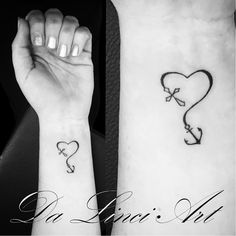 two wrist tattoos with hearts and arrows on the wrists, one is black and white