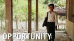 a young boy standing in front of a doorway with the words opportunity written on it