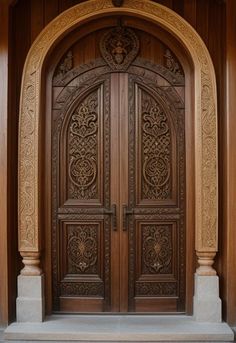 an ornately carved wooden door is shown in this image, it looks like the entrance to