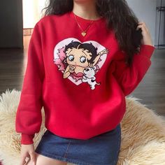 Celebrate your love for all things retro and nostalgic with this charming Betty Boop sweatshirt, perfect for adding a fun and playful touch to any wardrobe. Featuring a vibrant, vintage-inspired graphic of the iconic Betty Boop and her beloved pup, this sweatshirt is a statement piece that's sure to turn heads. Whether you're out running errands, relaxing at home, or meeting up with friends, this versatile sweater keeps you both cozy and stylish. Crafted from high-quality, ultra-soft fabric, thi Red Shirts, Winter Palette, Kitty Items, 90s Cartoons, Baby Tees Y2k, Y2k Baby Tee, Cartoons Love, Vintage Crewneck, Retro Mode