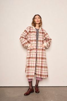 The Cameron coat adds a modern, feminine twist on the elemental bomber. Outfitted in a classic blush Plaid wool, this silhouette features exaggerated bishop sleeves, metal snap buttons, front patch pockets and classic rib trim. The perfect long coat to compliment your autumn ensemble. Our Model Kristi is 5’8 and wearing a XS. She normally wears XS, 26, or 0. Modern Feminine, Denim Jumpsuit, Wool Plaid, Winter Sale, Long Coat, Skirt Pants, Short Pants, Sweater Top, Jumpsuit Romper