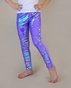 These fun, sequined pants are the perfect way to party in style! The cotton side provides breathable comfort, while the colorful reverse side is sequined flippin' fun!Front: 100% polyester Back: 100% cottonHand wash; hang dry Party Sequin Stretch Leggings, Party Full-length Leggings, Stretch Party Leggings, Spring Glitter Stretch Bottoms, Fitted Party Leggings, Playful Fitted Purple Bottoms, Playful Fitted Party Bottoms, Stretch Pink Sequined Pants, Stretchy Glitter Full-length Bottoms