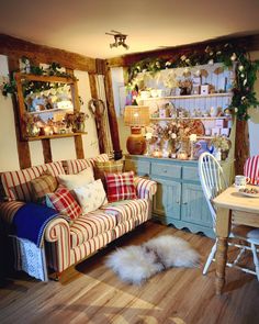 a living room filled with furniture and decor