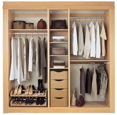 an organized closet with clothes and shoes