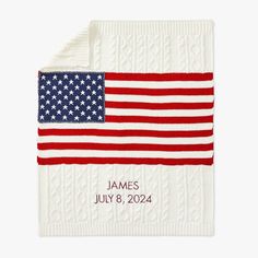 a white blanket with an american flag on it