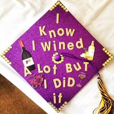 a purple graduation cap that says i know i wined alot but i did it