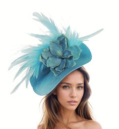 Turquoise Blue Feather Flower Ladies Royal Ascot Fascinator Hat Headband Womens Kentucky Derby Headpiece Day Headwear Wedding Church Hats Hats By Cressida Kentucky Derby & Ascot Fascinator Hats Turquoise Blue Jeanine Flower Feather Fascinator  Gorgeous array of feathers surround a large turquoise magnolia flower set on a round soft turquoise base.  Base measures 14 inches wide This turquoise headpiece is mounted with a matching headband. If you prefer a headband to match your hair, please make a Spring Blue Fascinator With Short Brim, Blue Costume Hats And Headpieces For Races In Spring, Spring Blue Mini Hats With Handmade Flowers, Summer Blue Headpiece With Handmade Flowers, Blue Fascinator With Handmade Flowers For Kentucky Derby, Blue Curved Brim Fascinator For The Beach, Blue Fitted Fascinator For Beach, Blue Fascinator For Kentucky Derby Garden Party, Blue Hats With Handmade Flowers For Royal Ascot