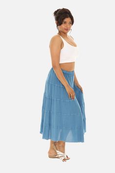 Give your warm-weather wardrobe a refresh with this midi skirt featuring a ruffled tiered design. Elastic Waist High Waist, -Long Maxi & Flared Skirt, Tone-On-Tone Embroidery Boho Print, Lightweight Woven Construction Unlined, Casual,Vacation,Beach Flowy Tiered Casual Skirt, Casual Flowy Tiered Skirt, Tiered Flowy Skirt For Day Out, Casual Midi Skirt With Ruffle Hem, Casual Ruffled Midi Skirt, Casual Tiered Flowy Skirt, Relaxed Tiered Skirt For Spring, Casual Maxi Skirt With Layered Hem, Casual Midi Skirt With Ruffles