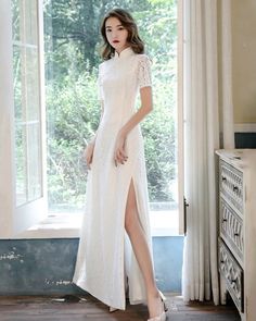 White Qipao Wedding Dress Long Lace Dress - Weqipao White Fitted Cheongsam With Stand Collar, Elegant White Wedding Dress For Ceremony, White Short Sleeve Evening Dress For Banquet, Elegant Ao Dai With Stand Collar For Ceremony, Elegant Ceremony Dress With Stand Collar, Elegant Dresses With Stand Collar For Ceremonies, White Fitted Cheongsam For Party, Elegant Fitted Cheongsam For Wedding, White Cheongsam With Stand Collar For Wedding