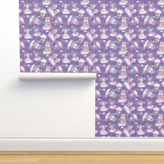 a purple wallpaper with snowmen and clouds on it