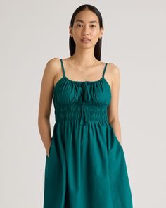 Discover the effortless charm of our 100% Organic Cotton Keyhole Midi Dress. Crafted with care from premium organic cotton poplin, this must-have dress has a cool, crisp look and a lightweight feel. The smocked bodice hugs your ribs in a flattering yet comfortable way, while the front tie and adjustable straps allow you to customize the fit. Best part: it has pockets! Easy to dress up or down, this chic silhouette works for a range of occasions.  | Quince | Women's Keyhole Midi Dress in Garden G Spring Cotton Sundress For Daywear, Casual Cotton Dress For Garden Party, Cotton Sundress For Daywear, Relaxed Cotton Dress For Garden Party, Relaxed Fit Cotton Dress For Garden Party, Casual Cotton Midi Dress With Smocked Back, Casual Cotton Dresses With Gathered Waist, Casual Cotton Dress With Smocked Back, Casual Cotton Midi Dress For Daywear