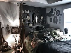 the bedroom is decorated in black and white