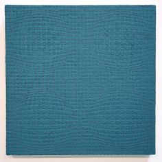 a blue square with circles on it