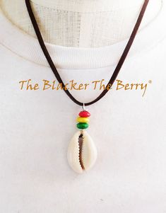 The Rasta necklace and earrings set comes together. The earrings are a cowrie shell with beads which are approximately 2.5 inches long. The brown necklace is adjustable and has a matching pendant. If you have any questions please feel free to contact us at anytime. Our products are not intended for babies or children as we use small pieces, wires and beads. These can be dangerous to them when unsupervised. Gift boxes and gift messages are available for your special orders. If you need the sizes Handmade Brown Cowrie Shell Jewelry, Bohemian Brown Cowrie Shell Jewelry, Cowrie Shell Jewelry With Adjustable Cord As Gift, Adjustable Cord Cowrie Shell Jewelry Gift, Adjustable Cord Cowrie Shell Jewelry As A Gift, Rasta Necklace, The Blacker The Berry, Loc Jewelry, African Earrings