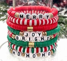 christmas bracelets are stacked on top of each other