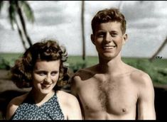 an old black and white photo of a young man and woman posing for a picture