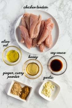 ingredients to make chicken tenderies on a marble counter top