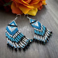 Southwestern inspired beaded fringe earrings made with Miyuki Delica Beads and Preciosa crystal beads. Southwestern Dangling Beads For Jewelry Making, Southwestern Fringe Beaded Earrings As Gift, Southwestern Beaded Fringe Earrings As Gift, Southwestern Fringe Beaded Earrings For Gift, Southwestern Style Beaded Fringe Earrings For Gift, Southwestern Fringe Earrings With Round Beads, Beads With Beaded Fringe For Jewelry Making, Southwestern Beaded Fringe Dangle Earrings, Southwestern Style Beaded Fringe Dangle Earrings