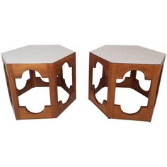 two wooden side tables with white top and one in the shape of hexagons