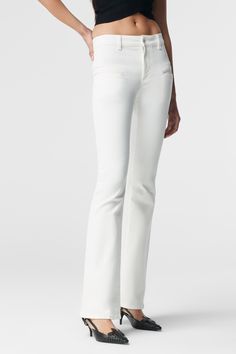 The signature 'Serge' Pant is back in an all-new optic white denim. A sleek, floor-grazing style with a bootcut hem and a mid-rise waist. Cut from durable denim with a subtle stretch, it's minimal yet elegant, detailed simply with front jet pockets. Denim Pant, White Denim, Mid Rise, Sleek, Pants, White, Trousers