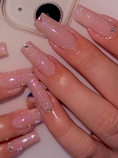 The best nude nail designs and ideas! Sharing the most classy nude nails and colors that look perfect for all occasions! Simple Boujee Nails Acrylic, Clear Light Pink Acrylic Nails, Nude Pink Sparkle Nails, Off Pink Nails, Prom Nails Acrylic Coffin, Simple Bday Nails, Flash Nails Design, Nude Sparkle Acrylic Nails, Pretty Nails Simple Acrylic