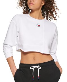 Rock a cropped look at the gym in this Tommy Hilfiger Sport sweatshirt in a patchwork design with a cutoff hemline.| Cropped fit| INSPIRED FOR; Active Lifestyle & Athleisure| Crewneck; patchwork design; logo print; cutoff hem| Cotton/polyester| Machine washable| Imported Womens Fitness, Sweatshirt White, Sports Sweatshirts, Winter Sweatshirt, Cropped Sweatshirt, Rock A, Workout Sweatshirt, Matching Family Outfits, Tommy Hilfiger Women