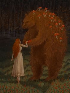 a woman in a white dress standing next to a brown bear with flowers on its back