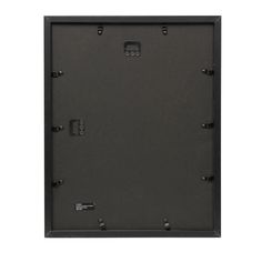 the back side of a black metal frame with two screw holes on each side and one hole in the middle