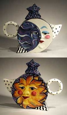 two vases with faces painted on them, one has a sun and the other is a moon