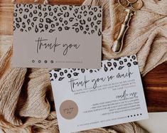 two thank cards with leopard print on them