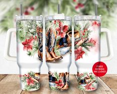 three travel mugs with the image of boots and poinsettias on them