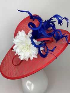 Red White and Blue Kentucky Derby Hat, Tea Party Hat & Church Hat! Make your statement with this stunning, high quality piece! *100% Brand new, hand made and high quality. *Head circumference: 22.5" and adjustable *Beautiful detail **Elegant fashion hats are perfect for horse racing events, church, the Kentucky derby, weddings, garden tea parties and charity events. ** Available to ship next business day. Don't forget matching gloves to complete the look! You can find them here! https://www.etsy.com/shop/QueenSugarBee?ref=seller-platform-mcnav&section_id=17799374 Ordering 4 or more pieces? Message me about group discounts! Like our Facebook page for future sales and new designs! Please join us here: https://www.facebook.com/QueenSugarBee Hear what others are saying about our shop: Jennifer Red Mini Hat With High Crown For Party, Red High Crown Mini Hat For Party, Red Brimmed Hat For Royal Ascot, Elegant Red Mini Hat With High Crown, Elegant Red High Crown Mini Hats, Red Hats For Royal Ascot Races, Red Brimmed Top Hat For Party, Red Flat Brim Boater Hat For Kentucky Derby, Red Flat Brim Party Hat