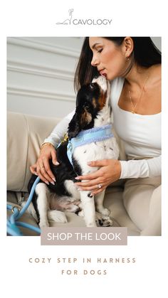 a woman sitting on a couch petting a dog with the caption shop the look cozy step in harness for dogs