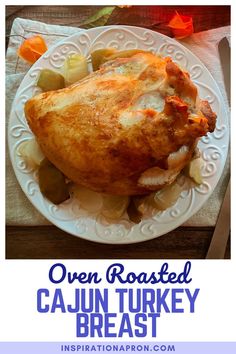 an oven roasted cajun turkey breast on a white plate