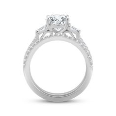 a white gold engagement ring with diamonds on it