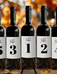 three bottles of wine with the number thirteen on them